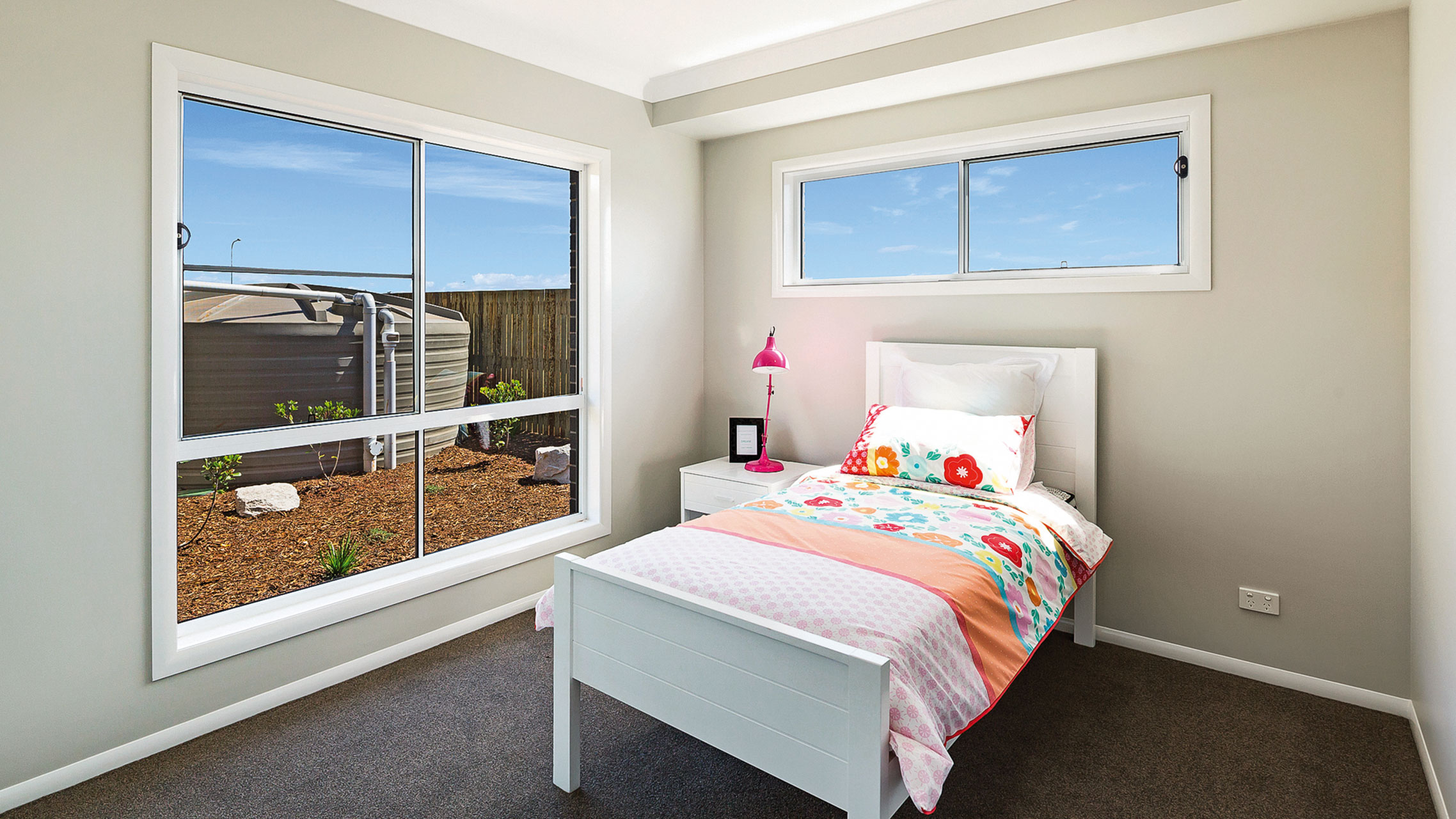 White Aluminium Sliding Windows in a bedroom